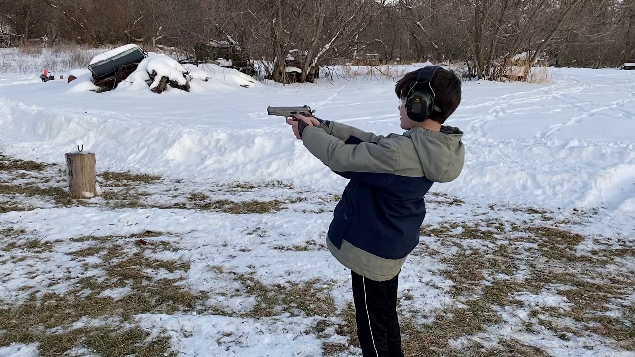 Niko&rsquo;s first time shooting, hits target at 35 feet. CZ 9mm