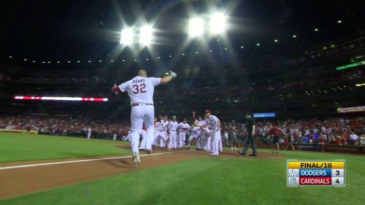 Adams crushes a walk-off homer in the 16th