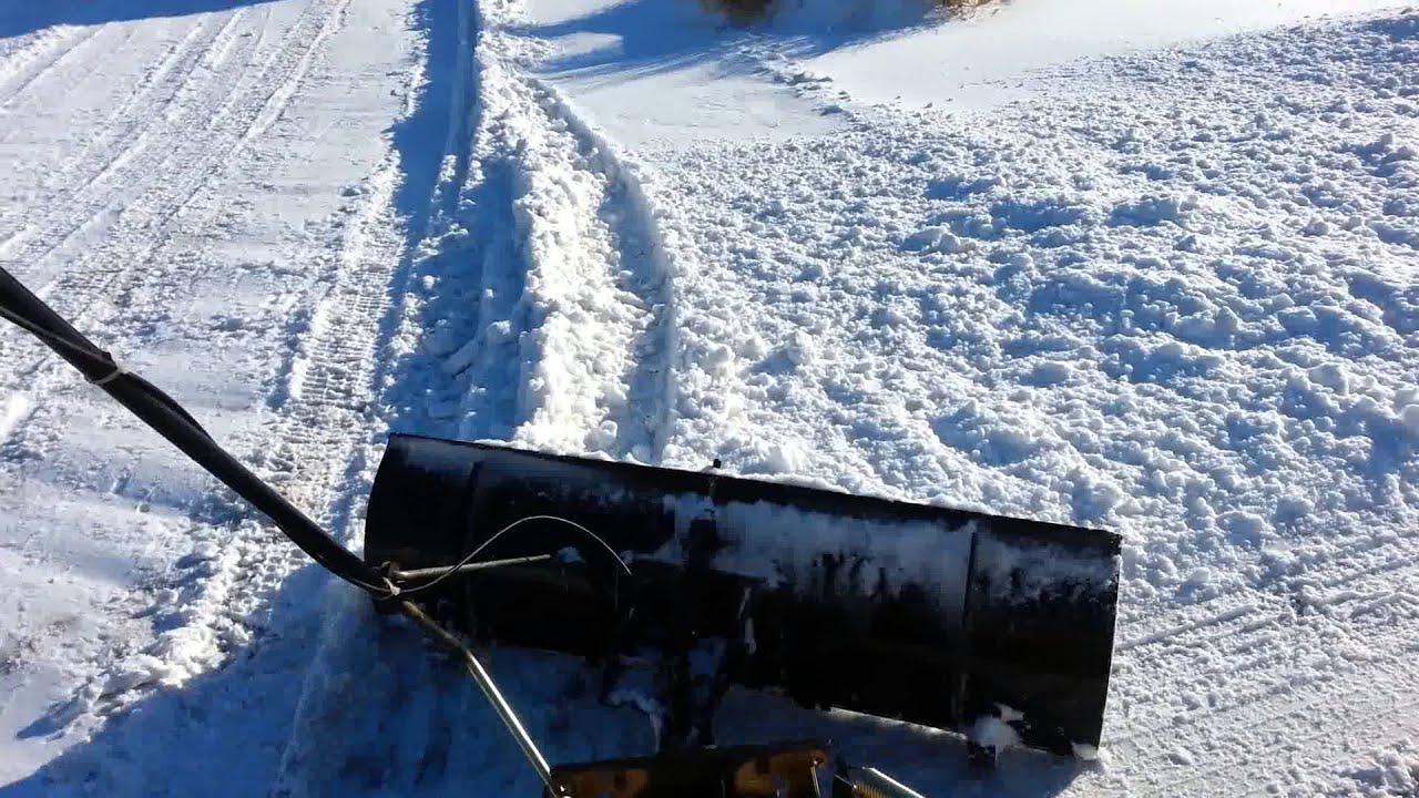 Cub cadet zero turn plowing snow