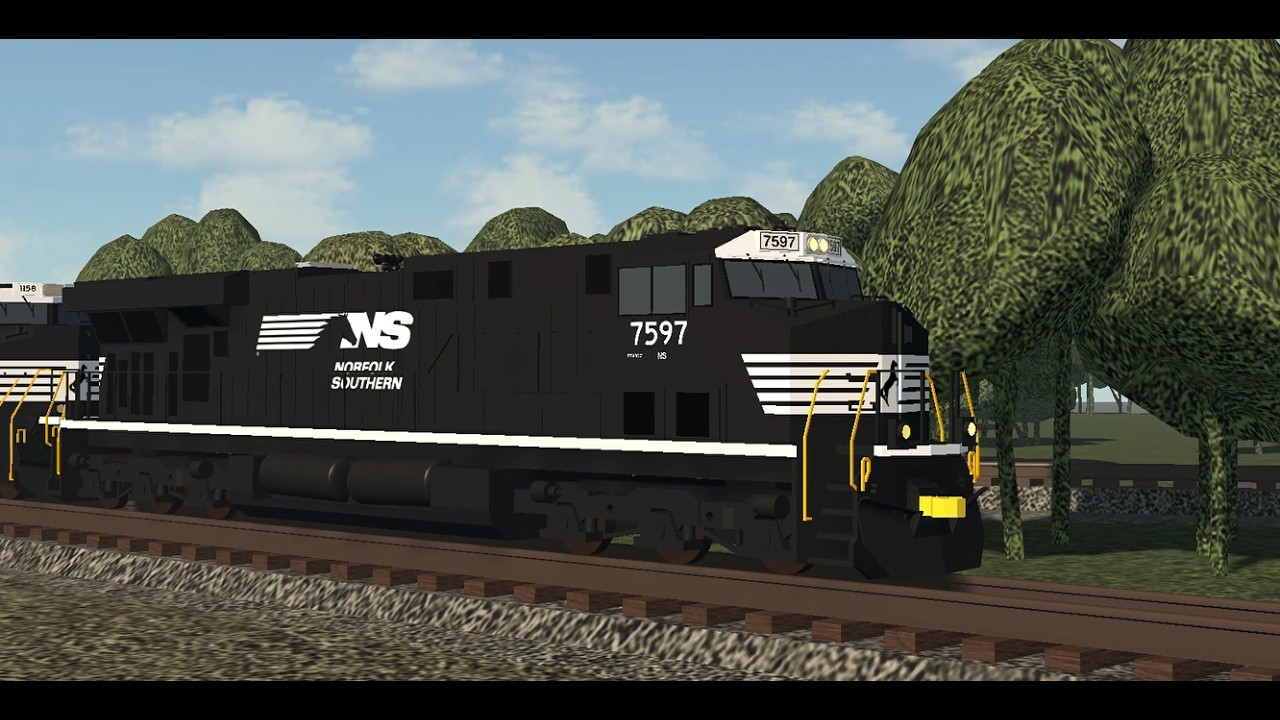NS 7597 ES44DC leads NS 61C steel train passing through in Sharonville, Ohio