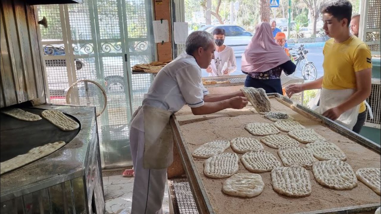 Authentic Barbari Bread Baked by Hard-Working Iranian Family - Delicious Recipe Revealed!