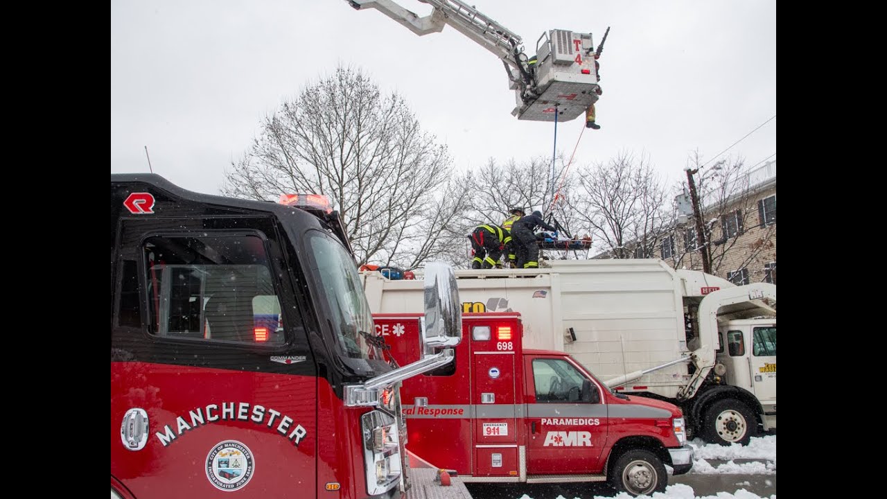 Manchester Firefighters Rescue Woman From Inside Garbage Compactor Truck