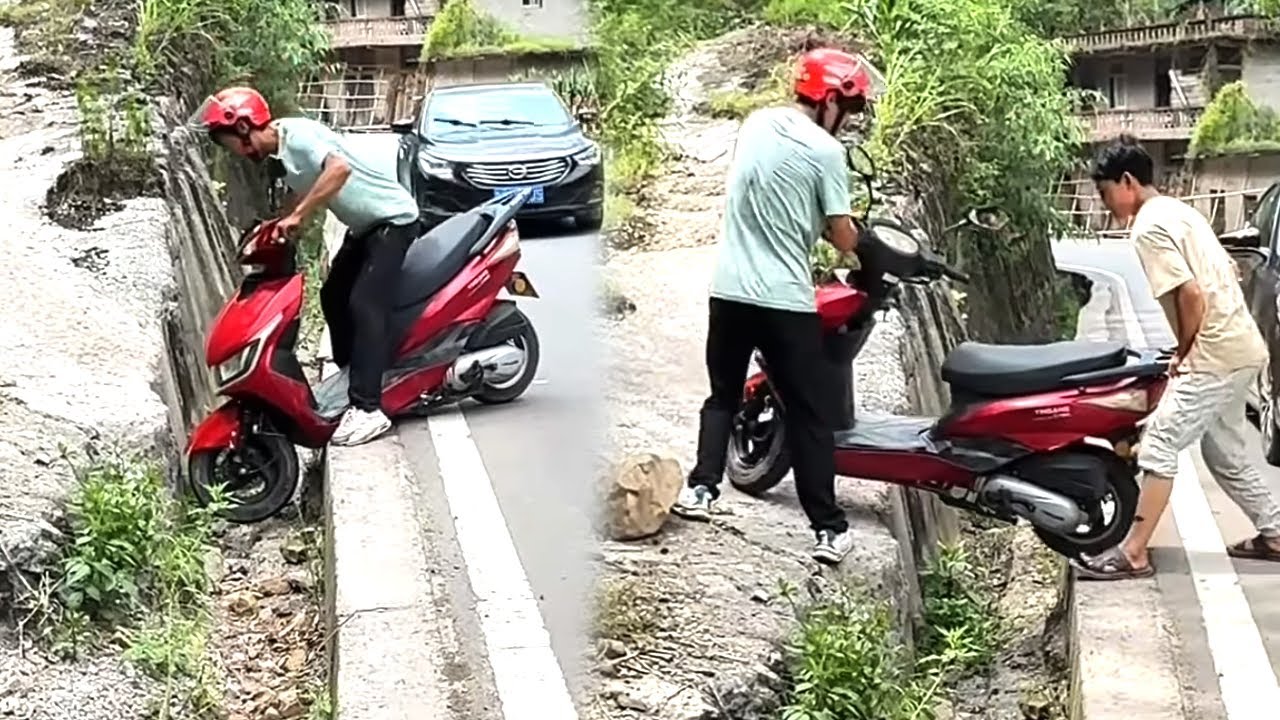 A young man's motorcycle got stuck in a ditch, and kind people helped lift it out.