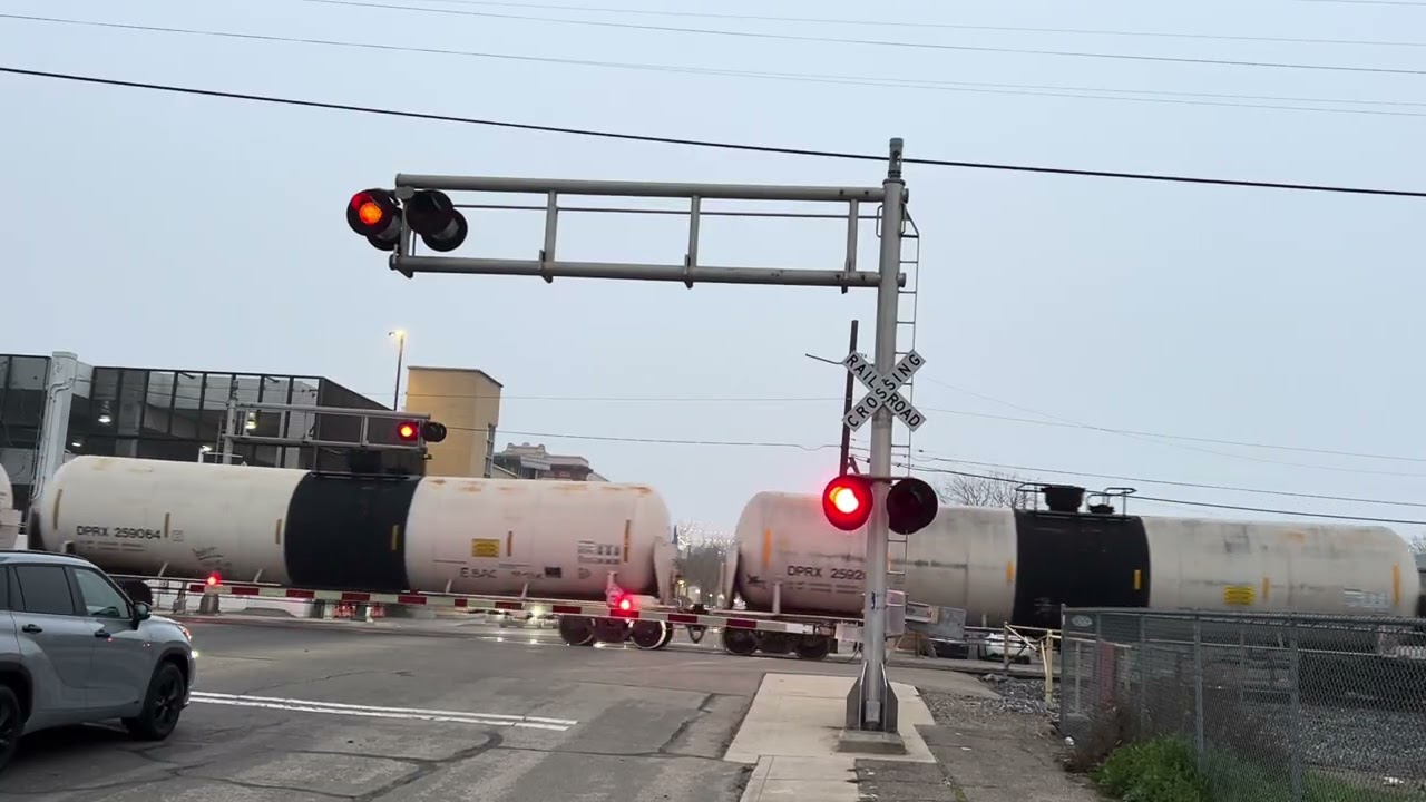 UP 8799 Manifest Train w/ Mid & Rear DPU(s) North - E, Elm Street. Railroad Crossing, Lodi CA