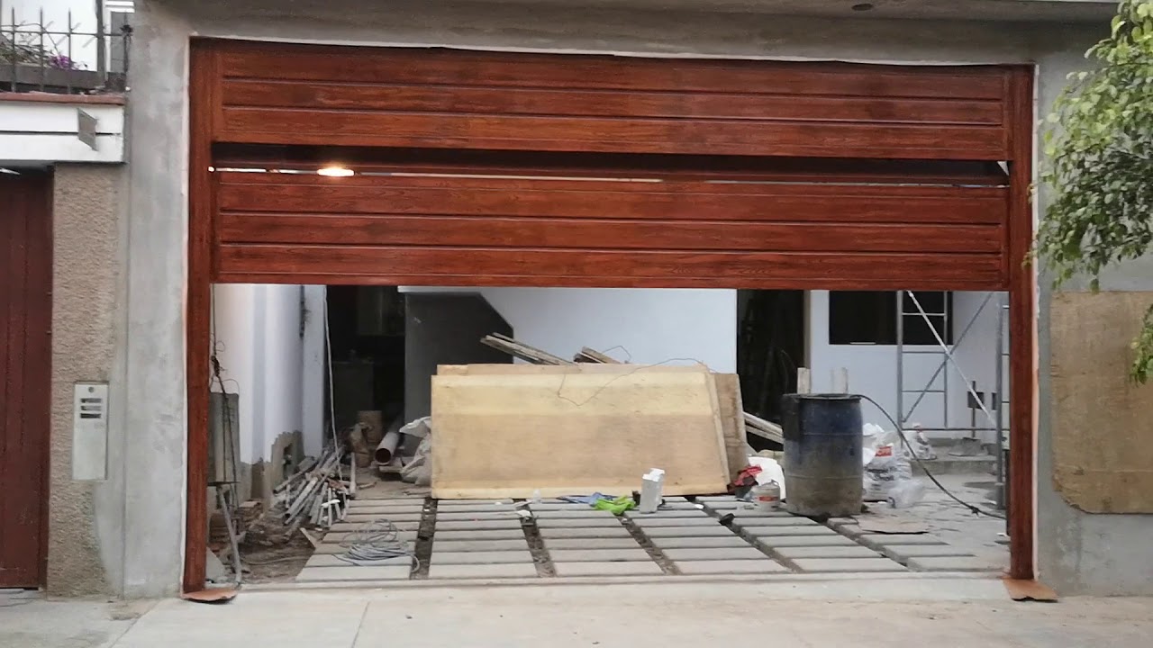 FABRICACIÓN E INSTALACIÓN DE  PUERTAS SECCIONALES EN PLANCHA GALVANIZADA ESPECIALISTAS SILVER