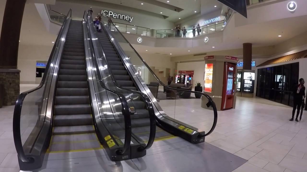 Sledding down escalator 2 - wait for it! Sledgang!! @50sec