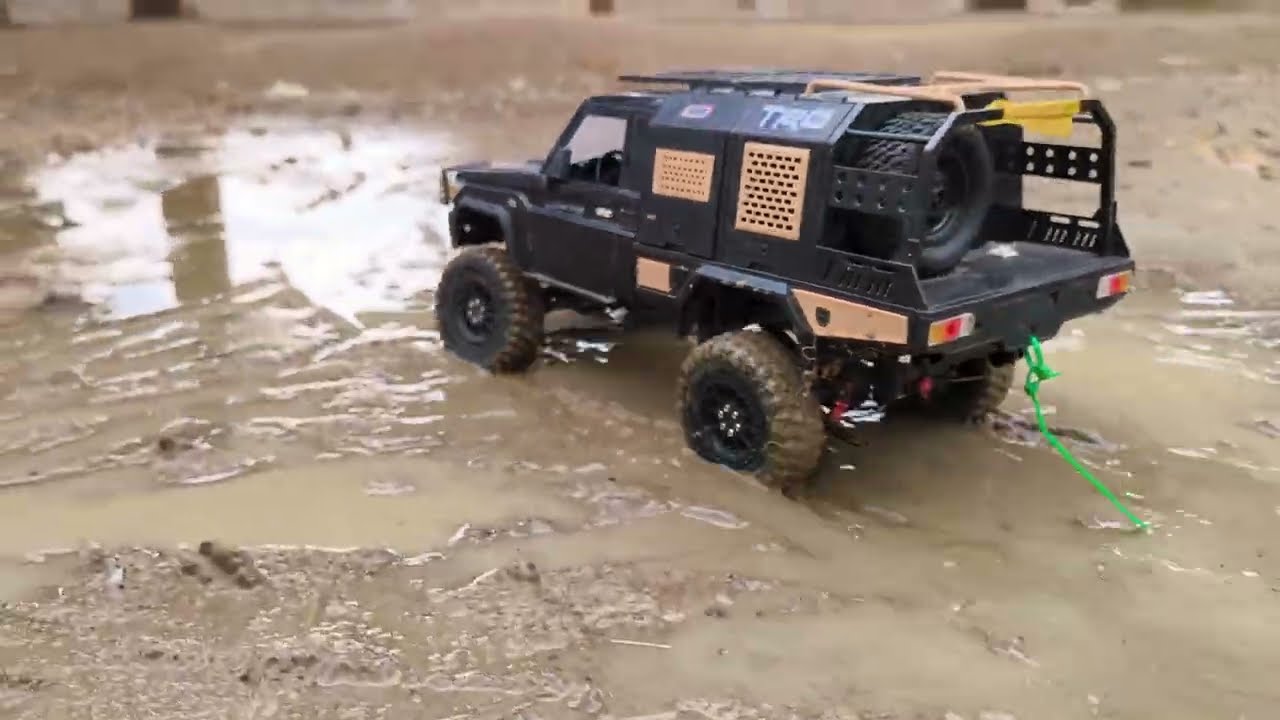 RC MN82s Toyota Land Cruiser 79 Series in Mud and Crystal Clear Water 