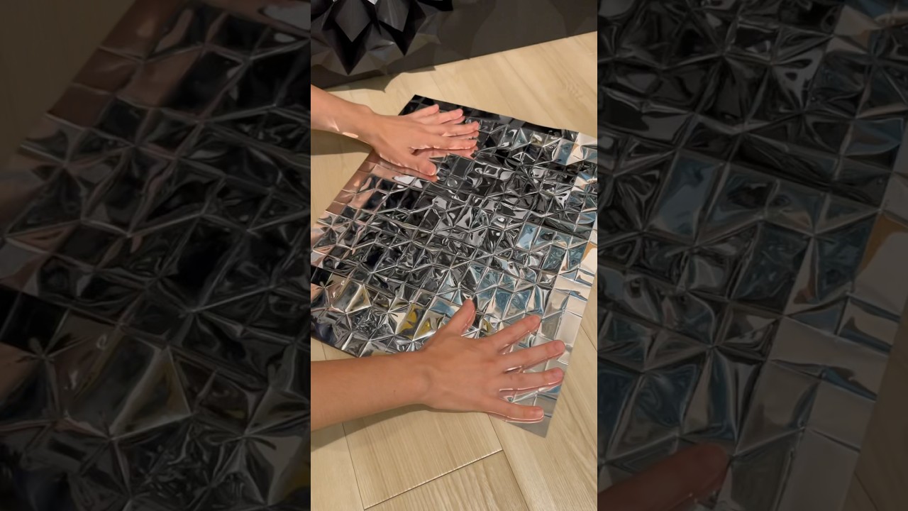 Folding reflective sheet into geometric forms. Origami; Prop 4(Reflective sheet)