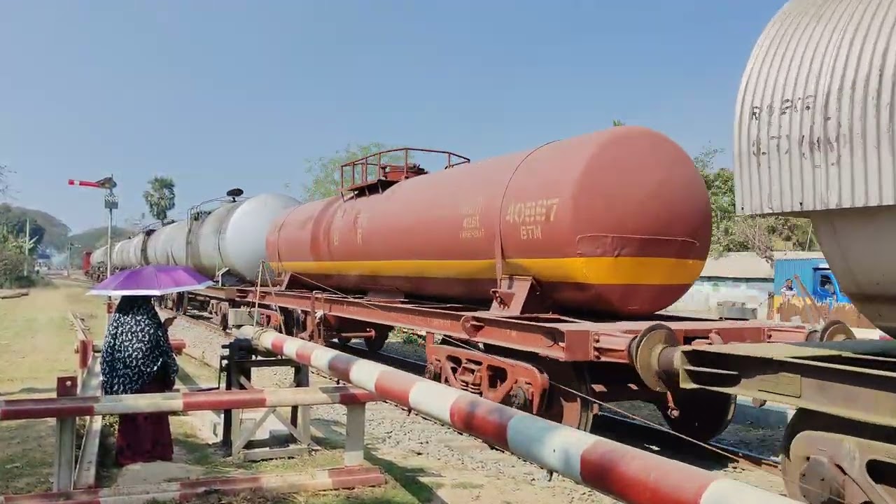 Woman on duty, BTO train passing || #viral #train #railtrack #video #railway #railgate #railcrossing
