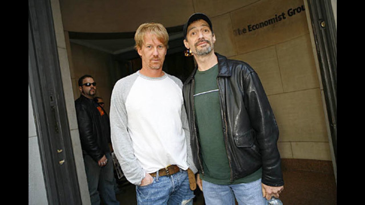 Opie and Anthony - Man runs over wife in driveway