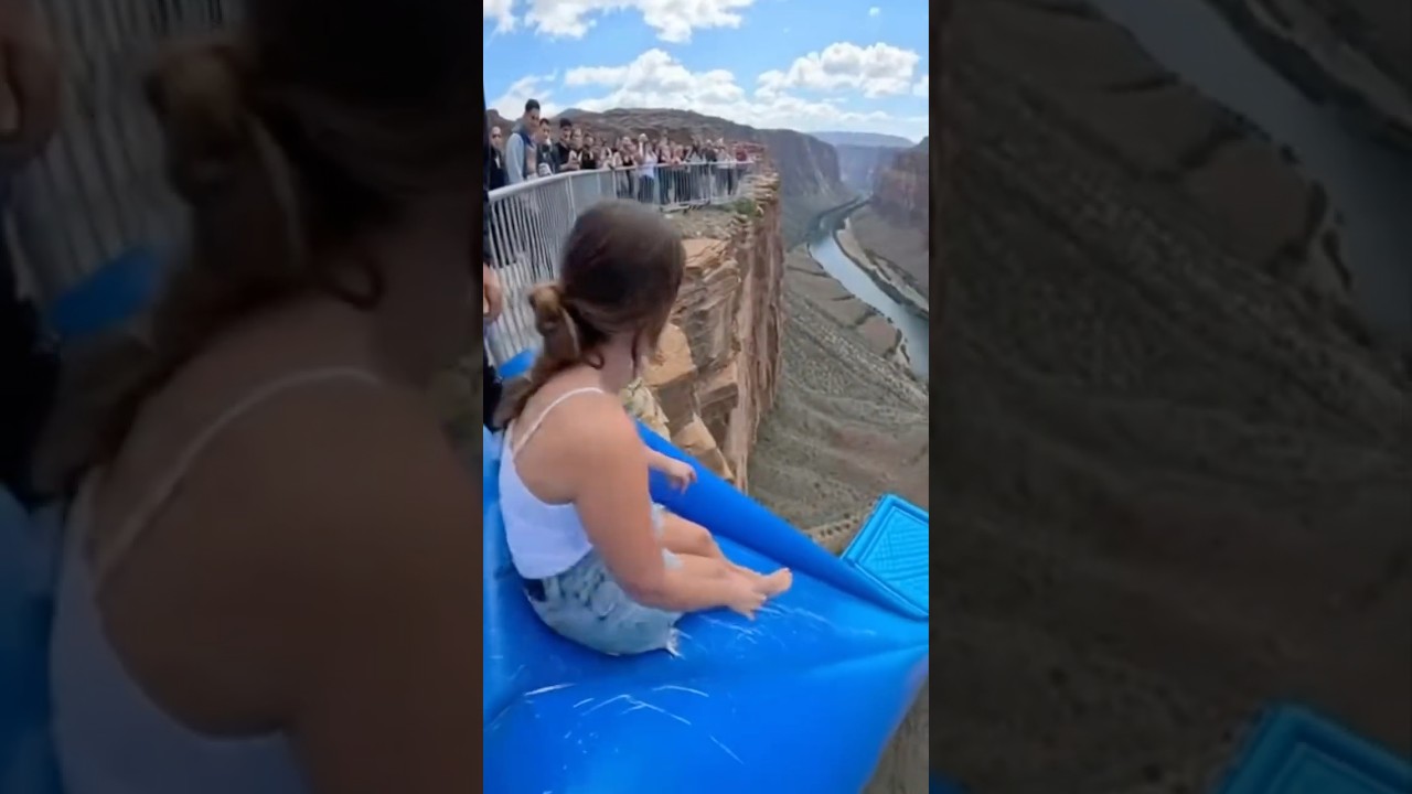 Cliff Slide is wild! 😱🔥 Girl slides, then flies! #ScaryRide #TravelWonderGuy