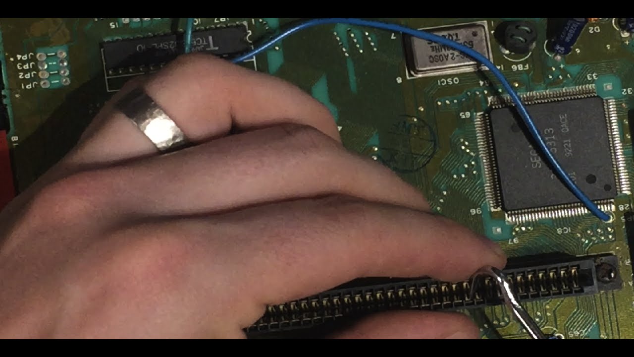 SEGA Genesis Console repair - Console 3 Re-tension cart slot pins - Part 4/7