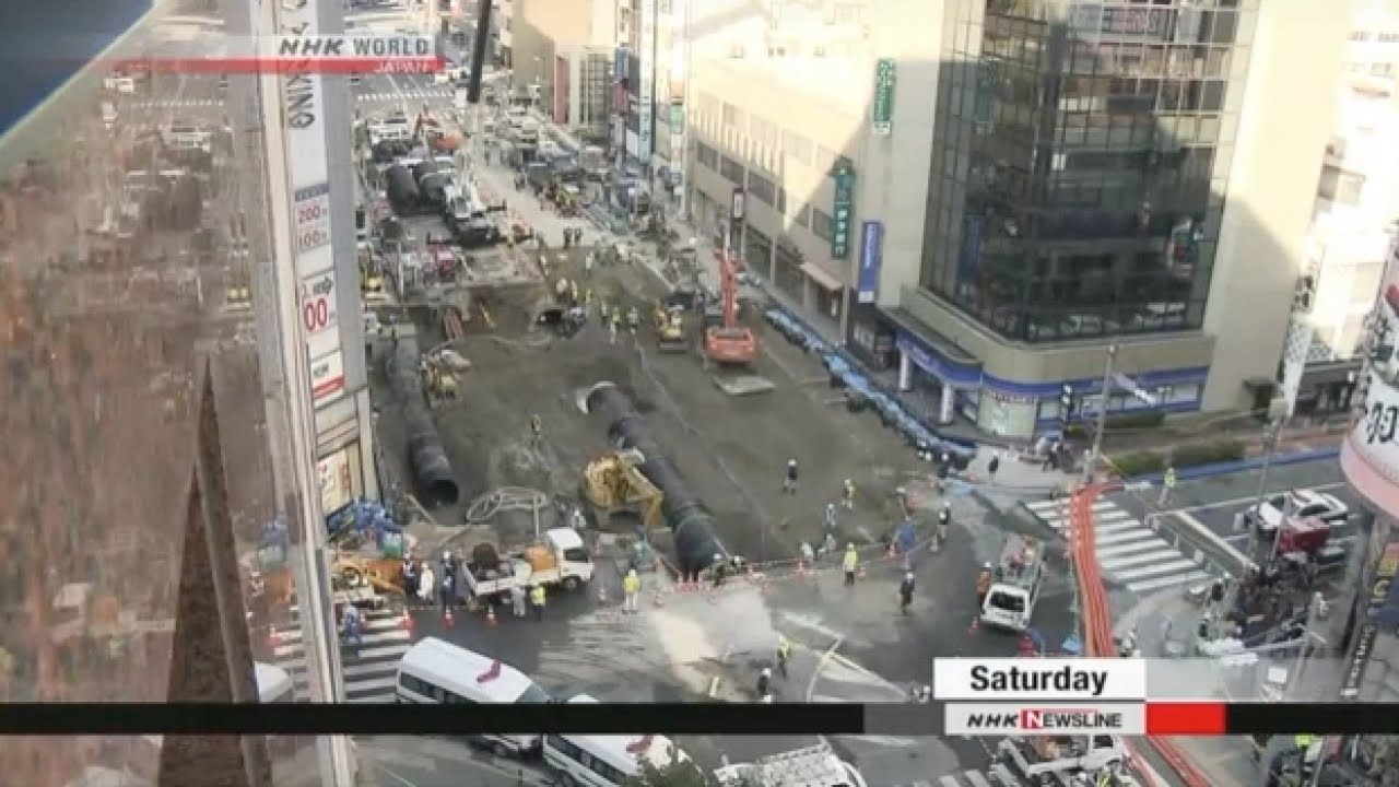 Japanese repair giant sinkhole in days