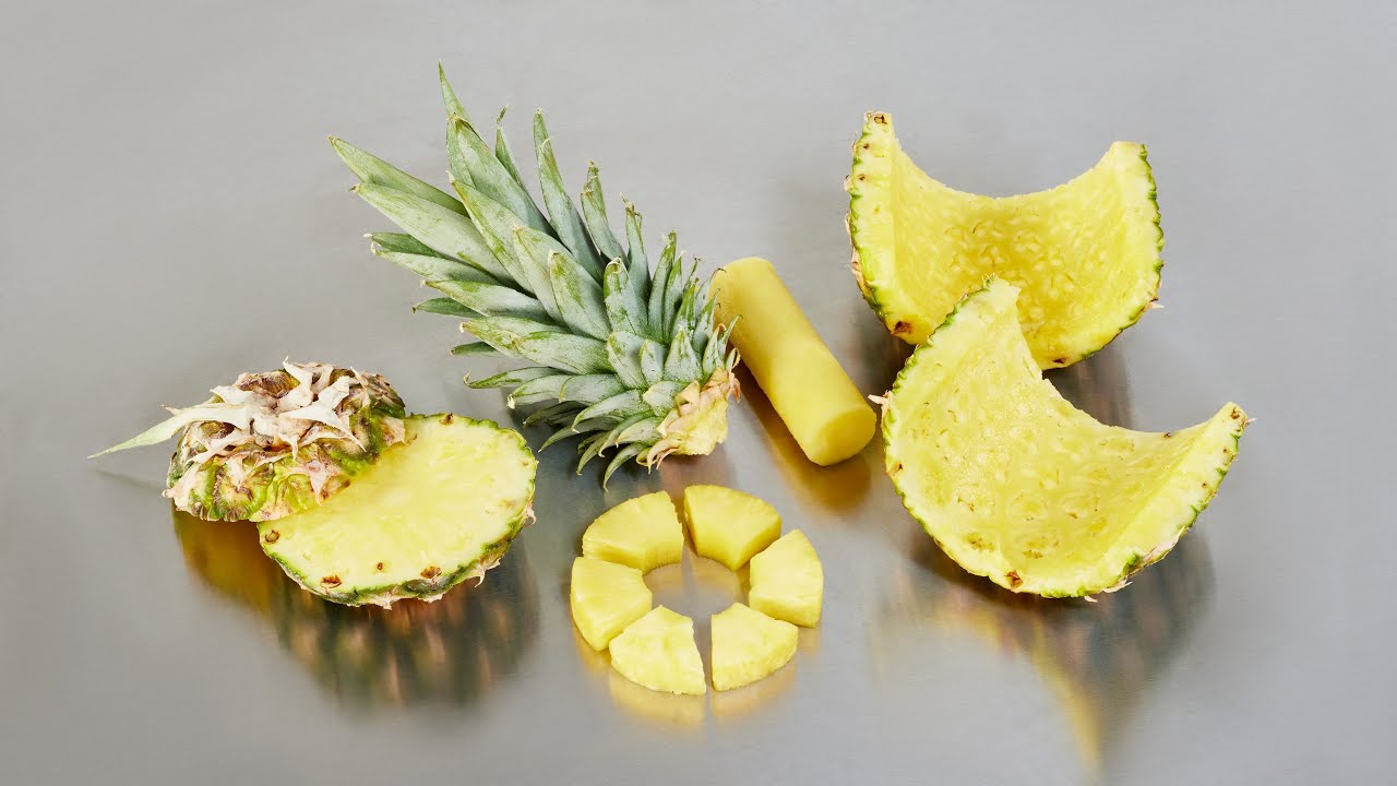 Manual pineapple processing line with the MPC 100 pineapple chunk cutter