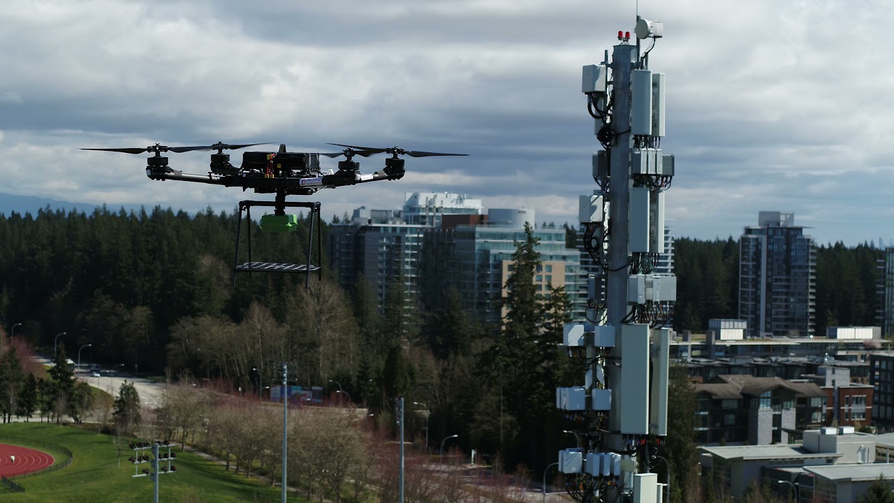Air to Air Large 5G drone doing cell tower inspection