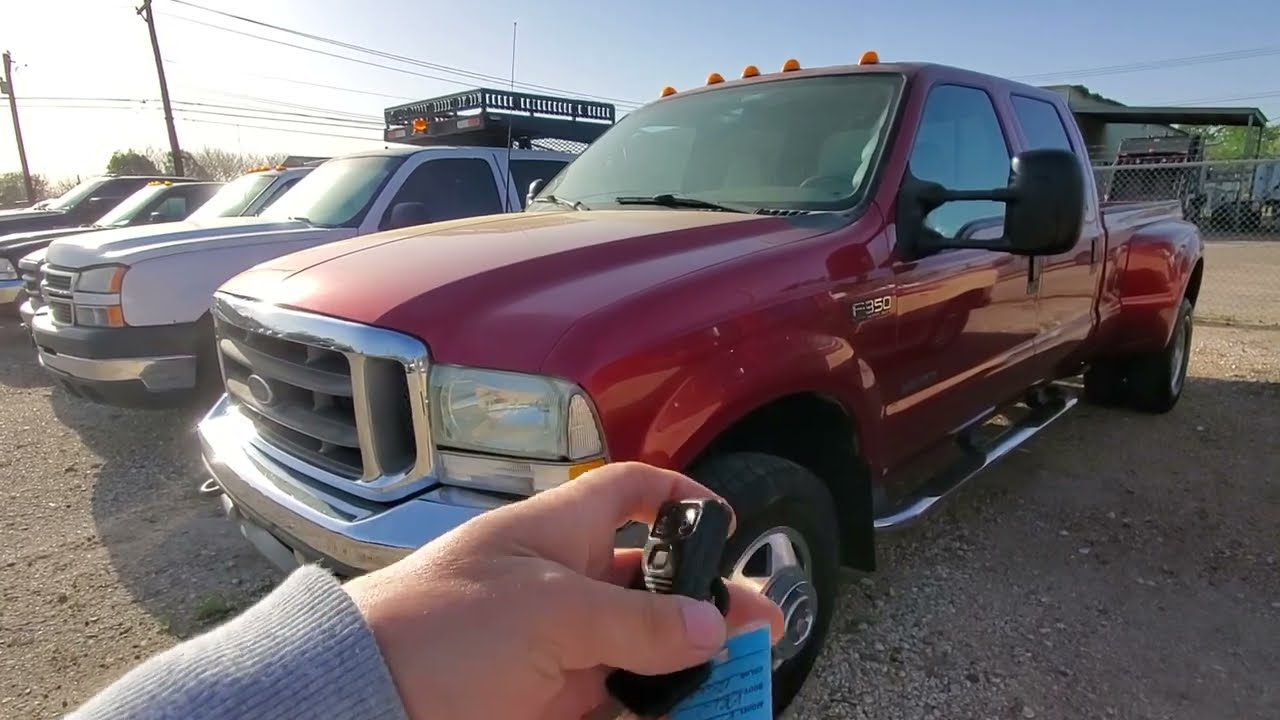 2002 Ford F350 Lariat 7.3L 4wd (red) - We Ship Nationwide