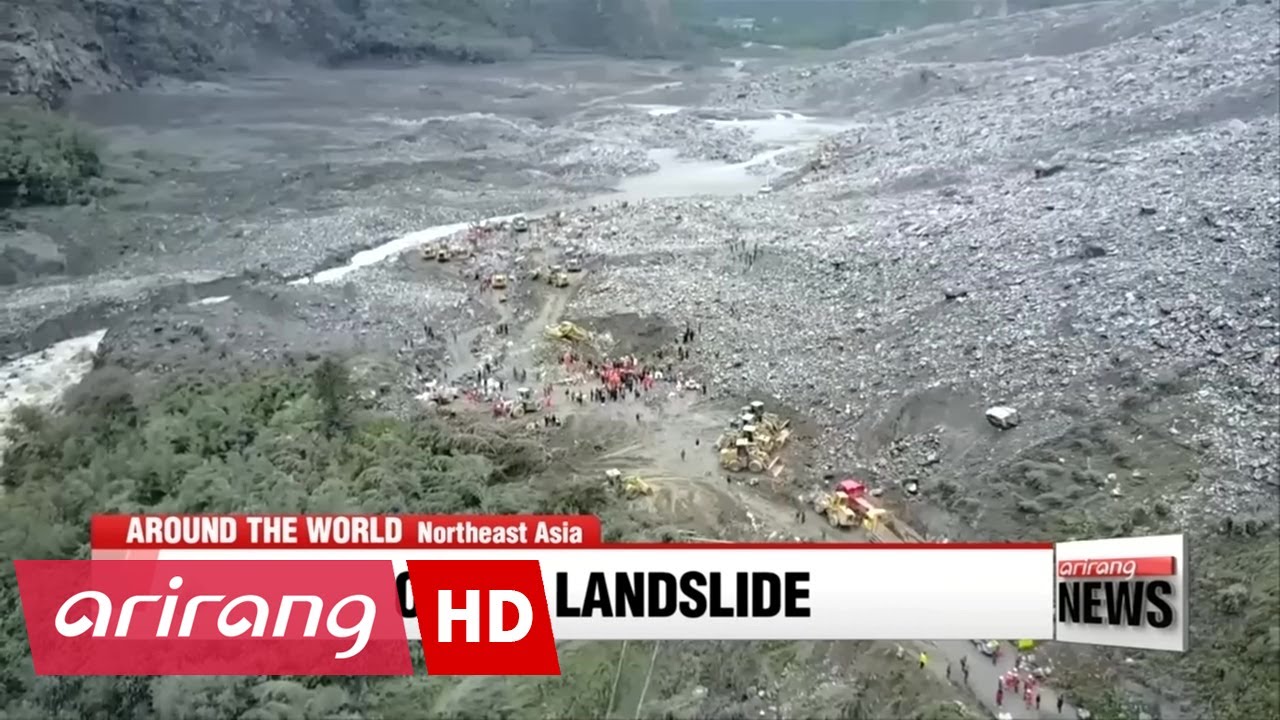 Nearly 100 missing as search continues in China landslide