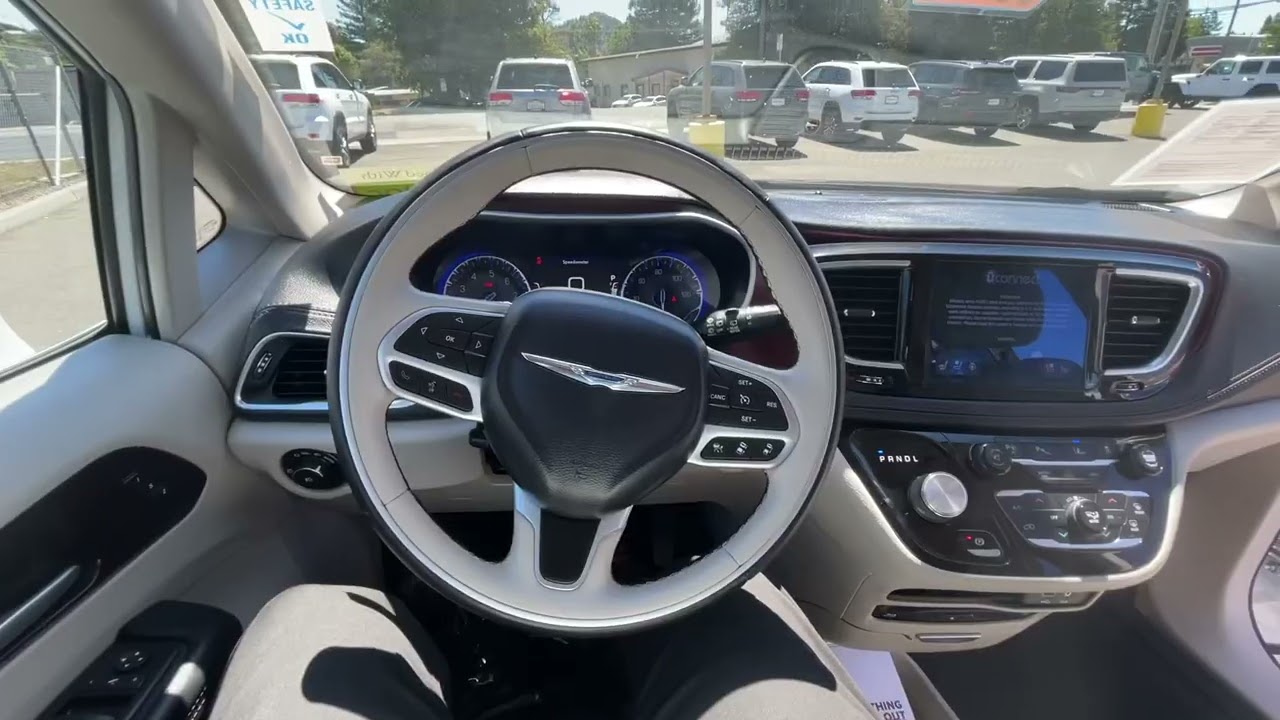 2017 Chrysler Pacifica Limited in White w/ Alloy interior.