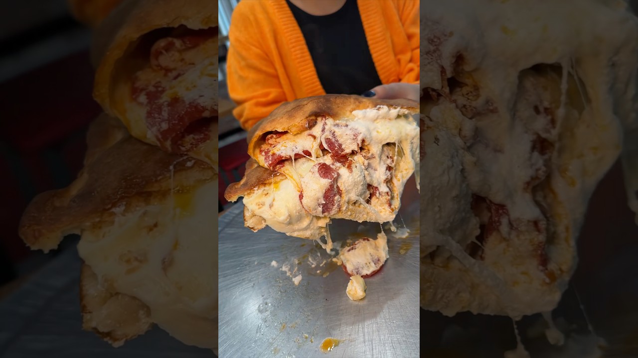 This CHEESY PEPPERONI CALZONE needs to be on your NYC DEVOUR-list! 🍕 Nuovo York Pizza! #DEVOURPOWER