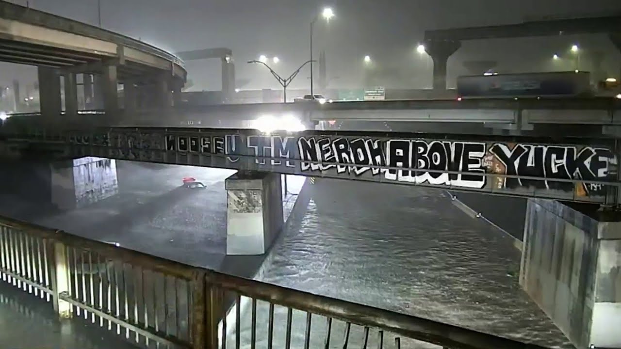 2 cars submerged in high water on Northeast Side