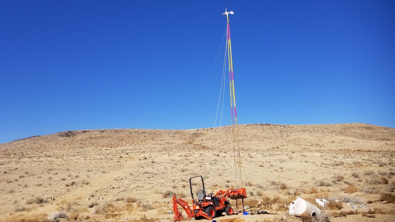 Wind tower guy anchor compaction, erecting of tower, and guy cable tensioning, Part 4