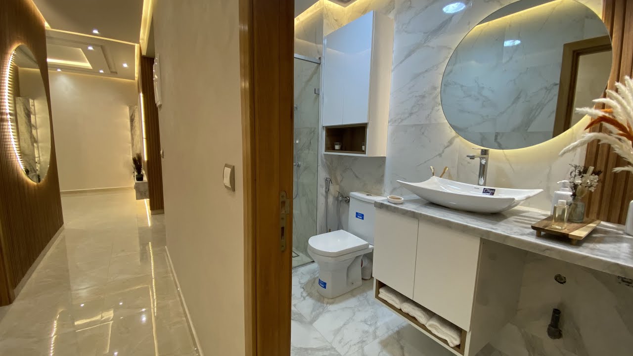 من روائع شقق مدينة بوزنيقة بالمصعد وجميع التجهيزات والموقع وسط فيلات appartement bouznika