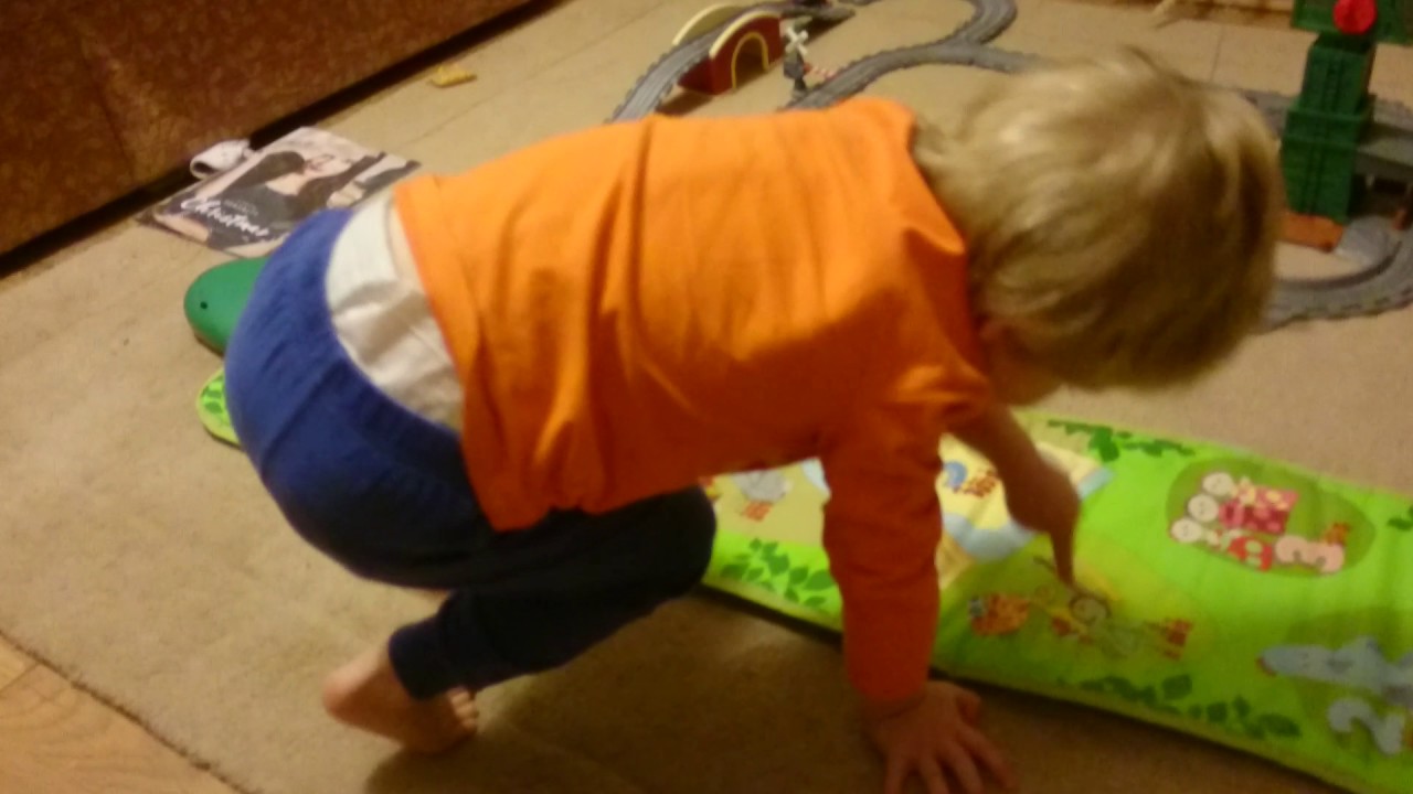 Theo and Daddy playing with the Night Garden play mat