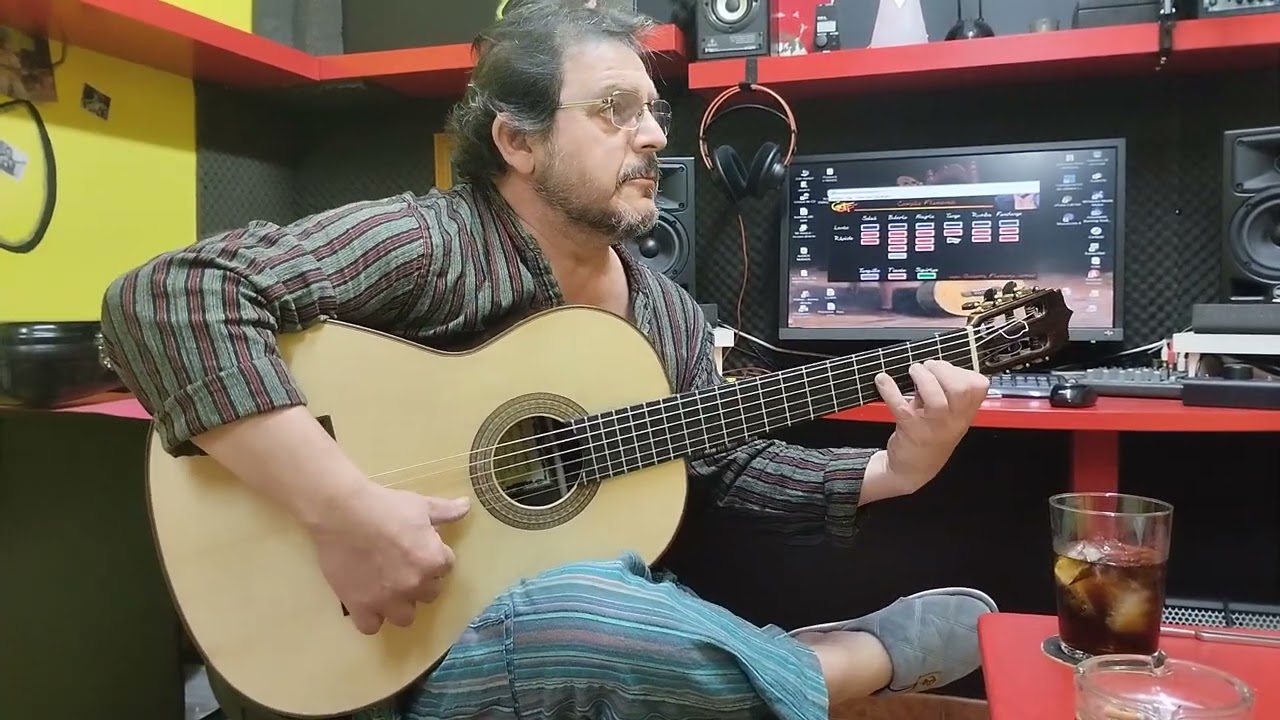 Enrique Gascón por tangos con guitarra de Palosanto de India.Guitarras Gómez del Carmen
