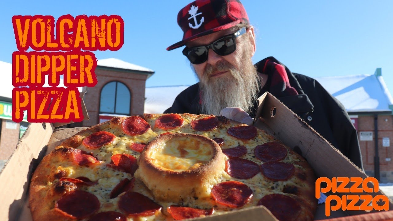Пробую новую пиццу Volcano Dipper от Pizza Pizza (чесночный вулкан!).