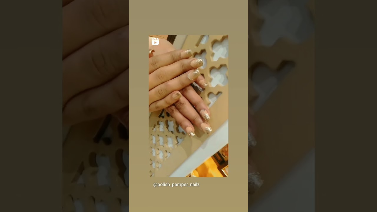 permanent nail extensions with glitter ombre with stone work