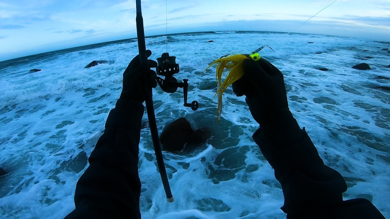 Surf Fishing on the Rocks with a Yellow Bucktail