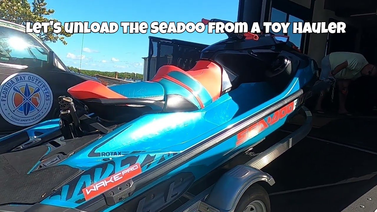 Watch us living full time RV er unload a Seadoo personal watercraft out of a Cyclone 4270 toy hauler