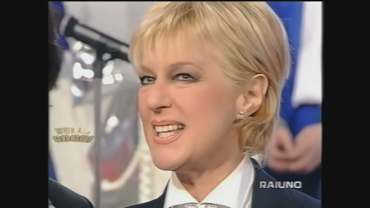 DOMENICA IN 1999 Ospite Loretta Goggi canta live alcune canzoni non sue e qualche imitazione