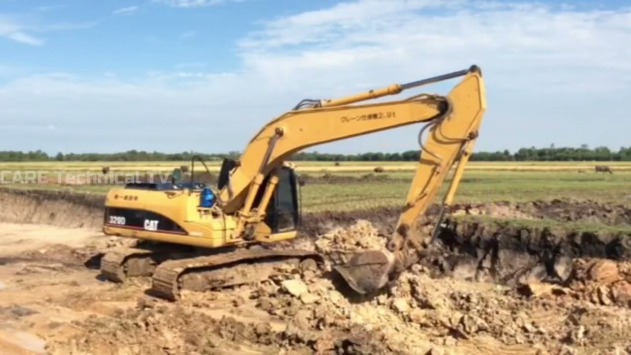 Amazing Caterpillar 320 Excavator And Caterpillar 320D is working to clear land for reservoir