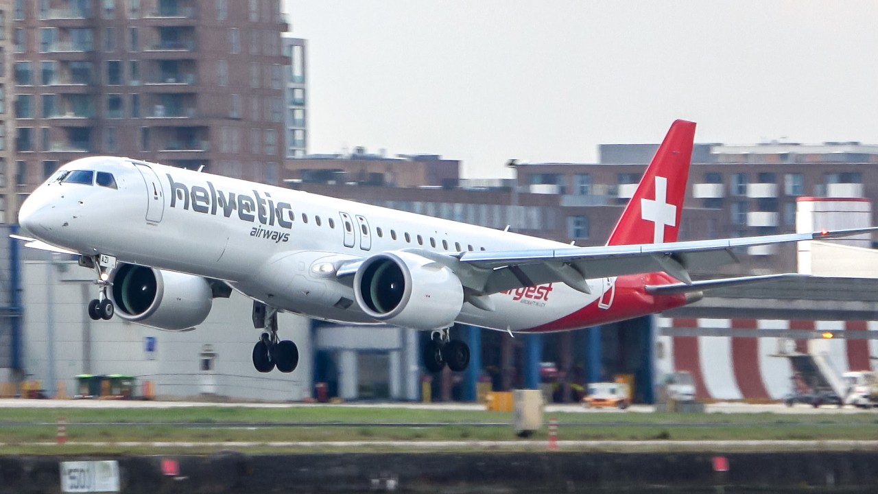 FIRST Helvetic Airways Embraer E295 lands at London City Airport