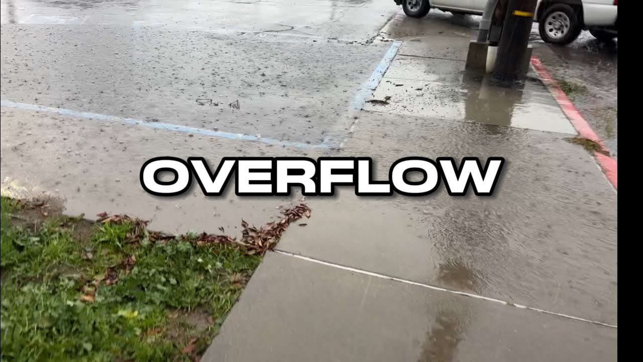 Flooded Parking Lot is Flowing onto the Road - let’s fix it