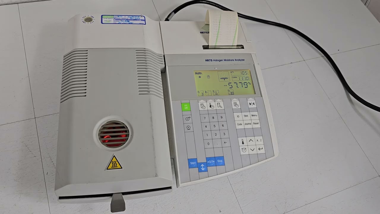 Testing a Mettler Toledo HR73-P Halogen Moisture Analyzer Sample Heater with Wet Paper Towel