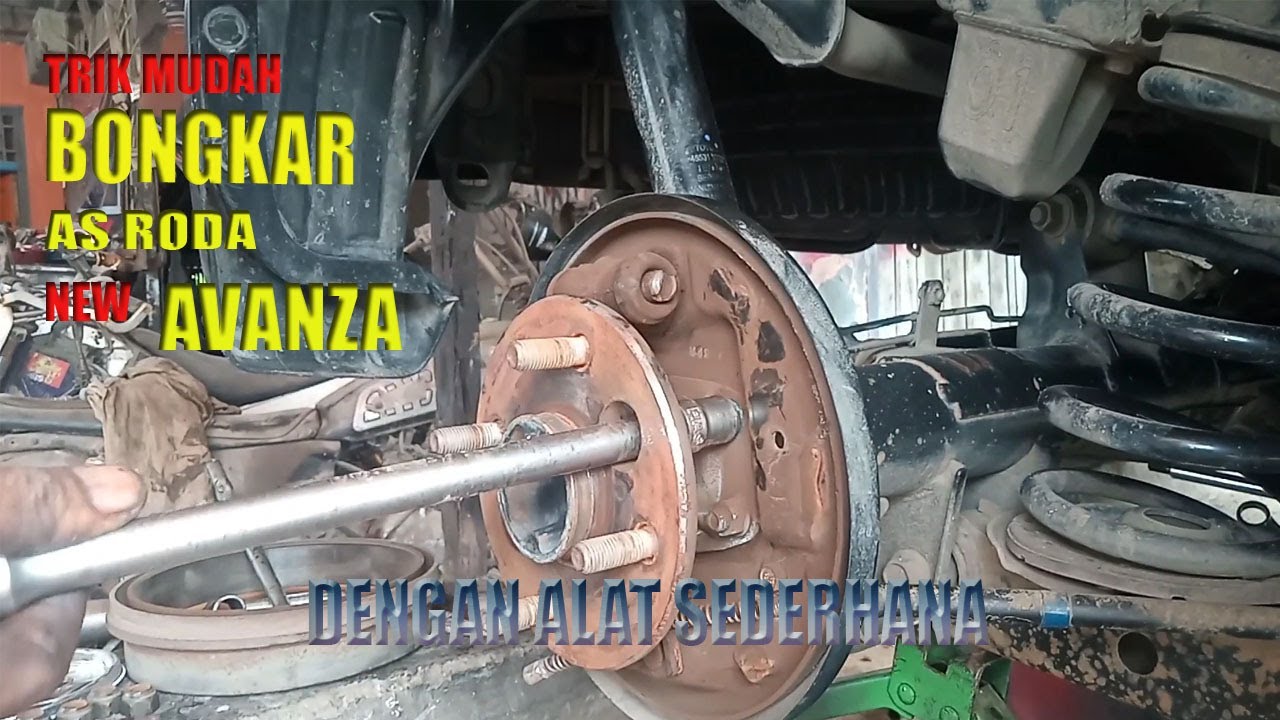 cara buka as roda belakang avanza