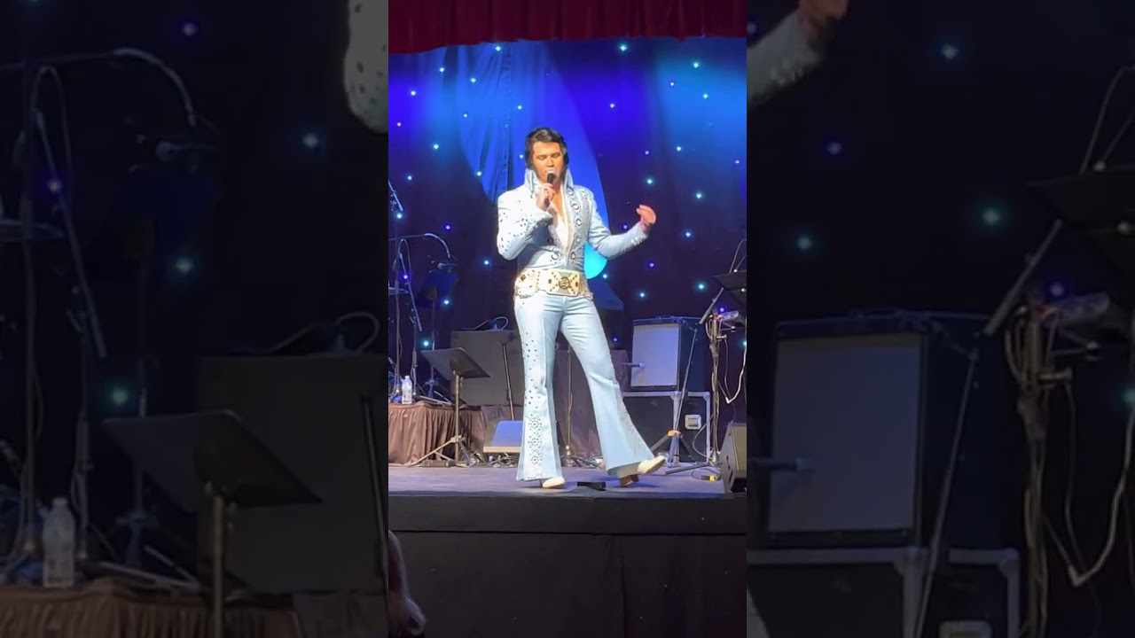 Jimmy Holmes as Elvis