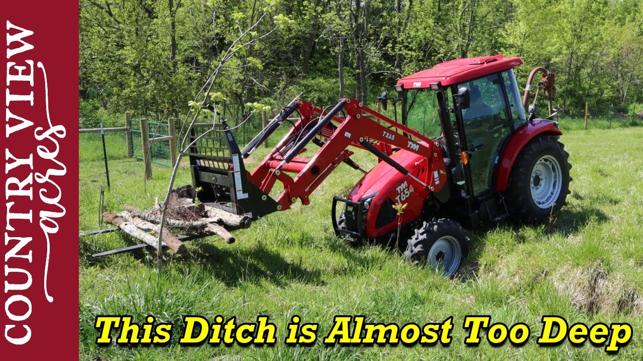 Removing old Fence Posts in our Pasture.  Bringing home Manure Spreader from Online Auction