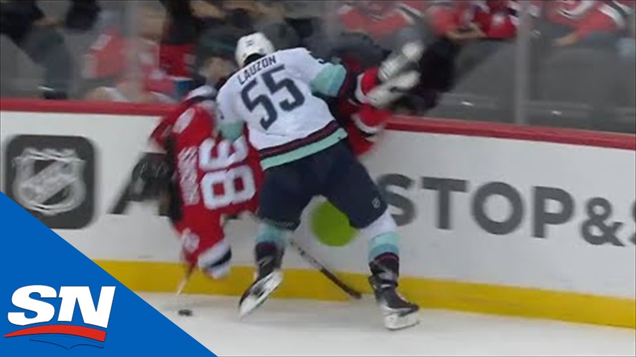 Jack Hughes Shaken Up After Crushing Hit Against The Boards From Jeremy Lauzon
