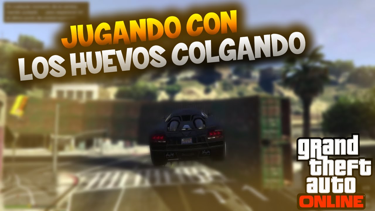JUGANDO CON LOS HUEVOS COLGANDO 