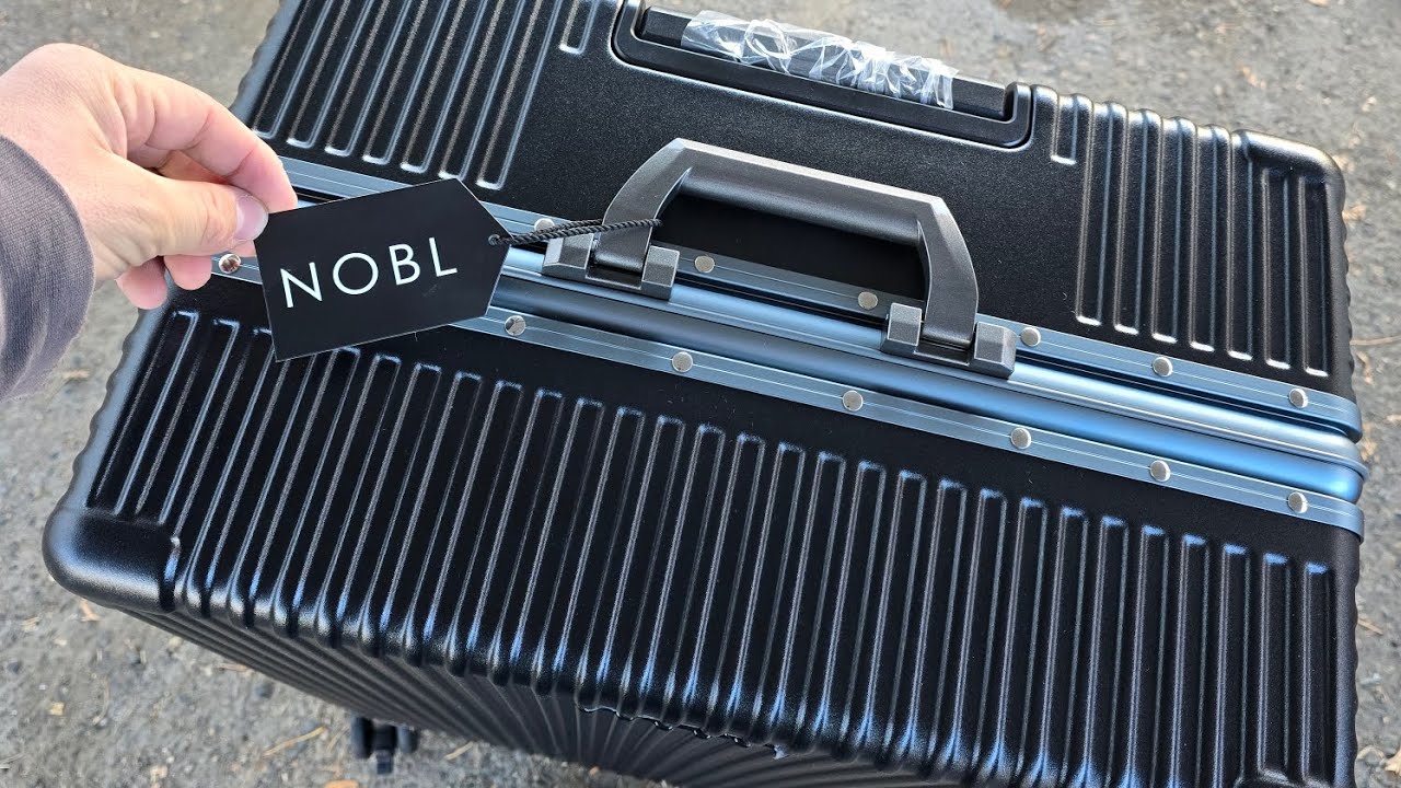 noble suitcase trunks with tsa approved locks. 28