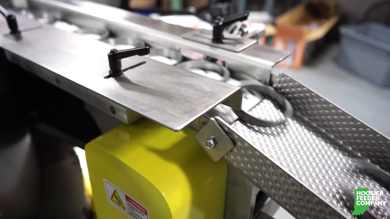 Heavy-Duty Orienting Conveyor Feeder for Bearings
