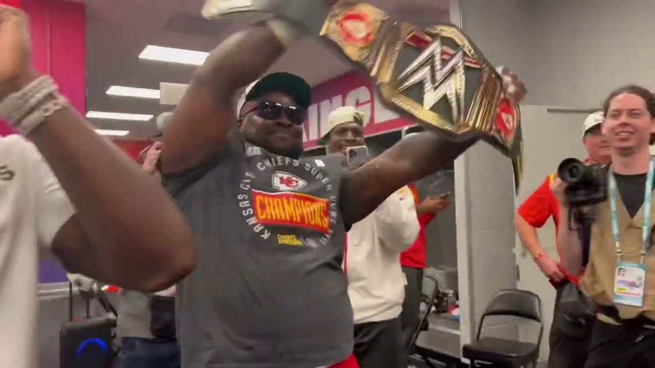Patrick Mahomes opens the WWE title that was waiting for him at his locker after the Super Bowl.