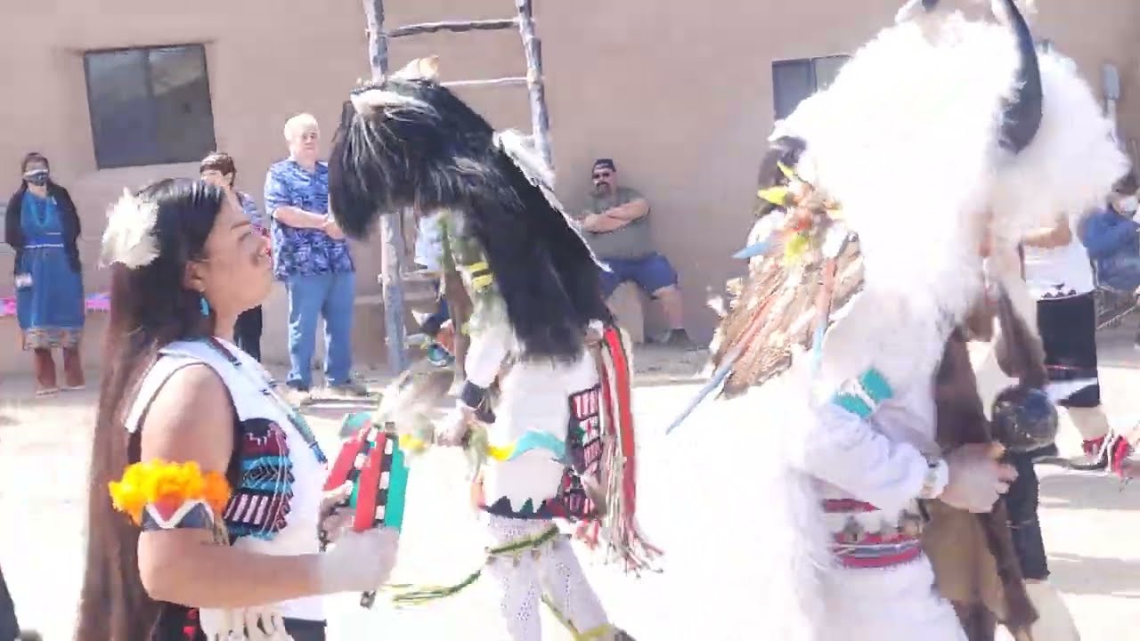 BUFFALO DANCE  - OHKAY OWINGEH PUEBLO  EASTER SUNDAY CELEBRATION – Buffalo entering North Plaza