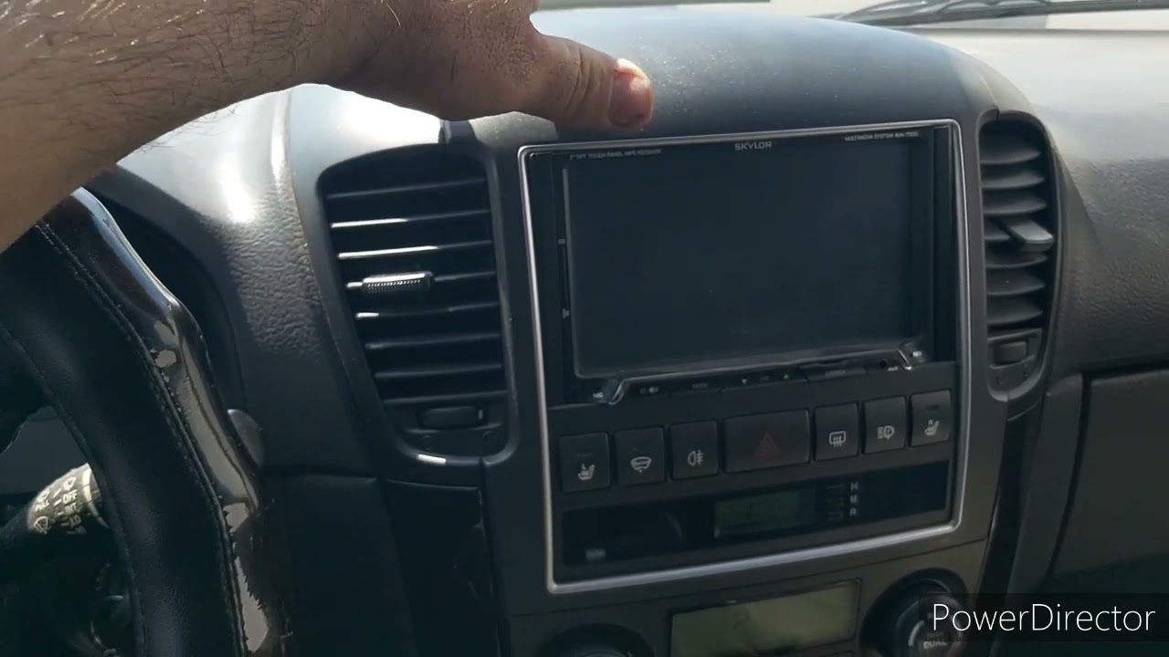 как снять панель магнитолы Киа Соренто 2011 год