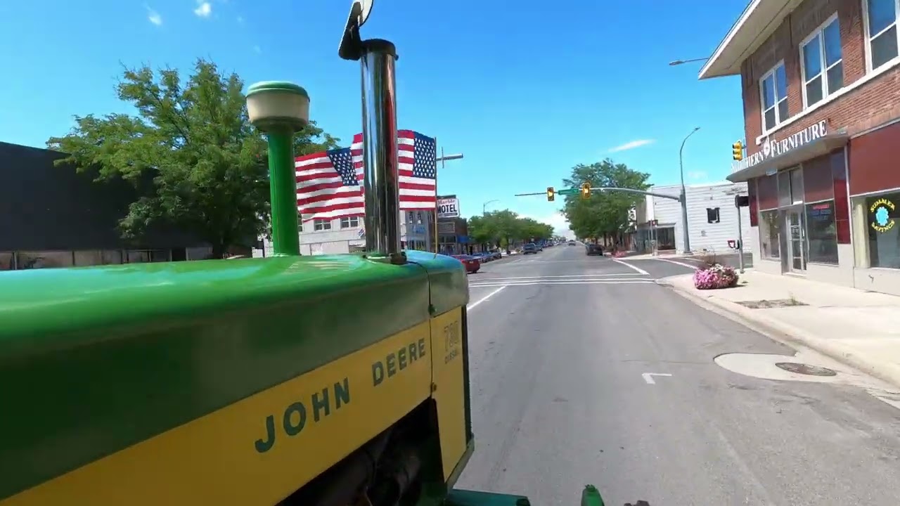 John Deere 730 through Tremonton City; going to county fair.