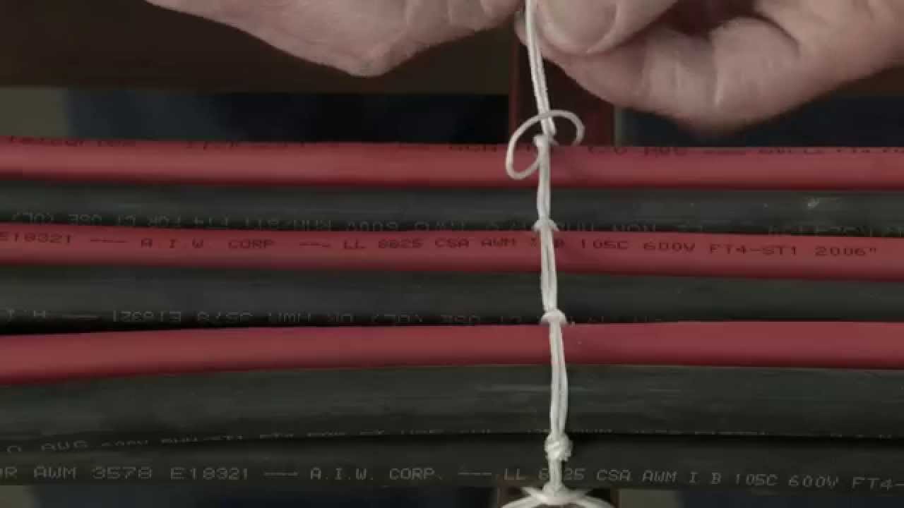 Instructional cable lacing sewing a Kansas City Stitch Second Cable Layer