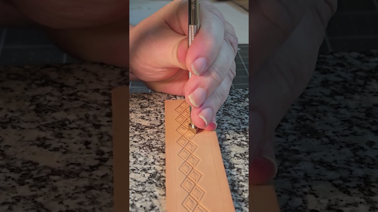Hand stamping a Leather Belt